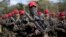 FILE - Soldiers who will be deployed during the Olympic games are presented during a ceremony in Rio de Janeiro, Brazil, July 8, 2016. 