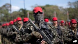 Soldiers who will be deployed during the Olympic games are presented during a ceremony in Rio de Janeiro, Brazil, July 8, 2016. 