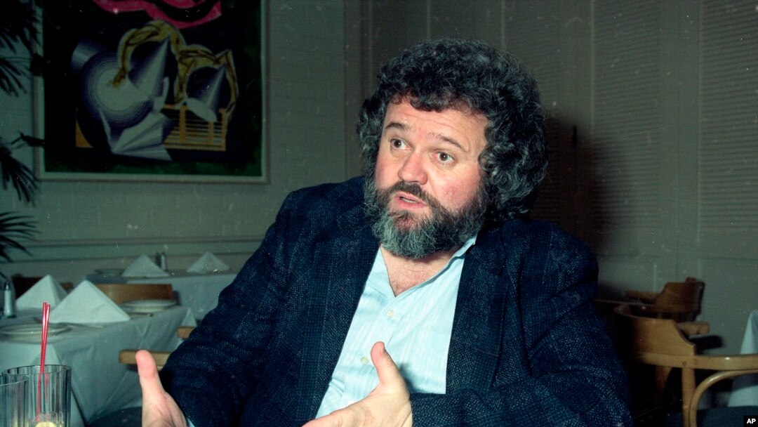 FILE - This 1990 file photo shows director of photography Allen Daviau speaking during an interview in Los Angeles. Daviau, who shot three of Steven Spielberg’s films, died April 14, 2020.