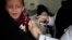A boy reacts as he receives a diphtheria vaccine at a hospital in Sanaa, Yemen, Sept. 9, 2019. 