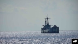 FILE - Philippine navy ship BRP Sierra Madre is seen at the Second Thomas Shoal in the South China Sea, April 23, 2023. A Chinese vessel and a Philippine supply ship collided near the disputed Spratly Islands in the South China Sea on June 17, 2024, China's coast guard said.