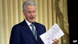 Former President Bill Clinton speaks during the ceremony naming the new Environmental Protection Agency headquarters in Washington, after him, July 17, 2013.