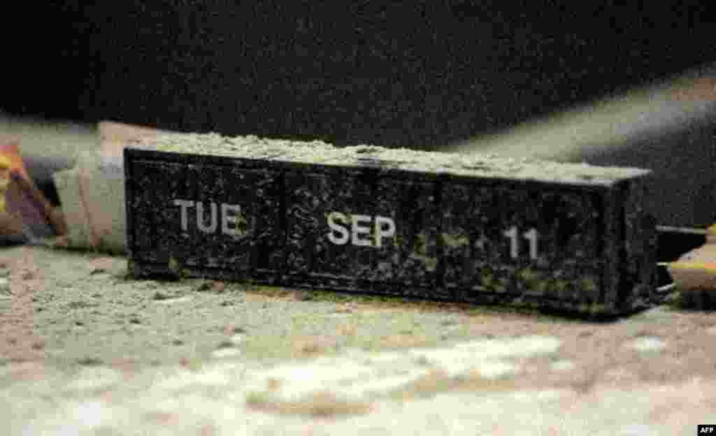 The date of the terrorist attacks on the World Trade Center is shown on a calendar covered in ash on a counter at the Chase Manhattan bank on Broadway Thursday, Sept. 20, 2001, about a block from the World Trade Center site in New York. The bank has not 