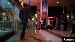 Blood is seen on the ground outside after a knife attack at Kunming railway station, Yunnan province, March 1, 2014. 