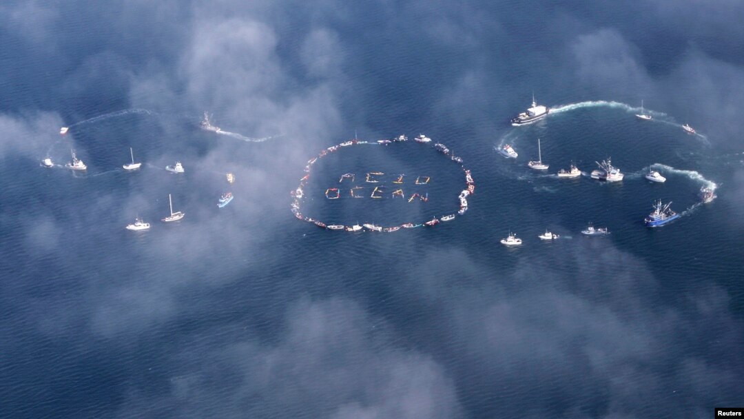 Commercial fishermen, mariners form "SOS" to spread message of saving oceans from acidification caused by fossil fuel emissions, Homer, Alaska, Sept. 6, 2009.