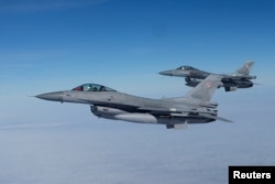 Pesawat F-16 berpartisipasi dalam latihan militer bersama NATO di Malbork, Polandia 21 Maret 2023 lalu.