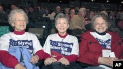 Katie McCann, and Bev Stogdill (L-R) from Johnston, Iowa, await the beginning of the Iowa Faith & Freedom Coalition's Spring Event at Point of Grace Church in Waukee, Iowa. Five possible Republican White House hopefuls courted conservative voters in Iowa,