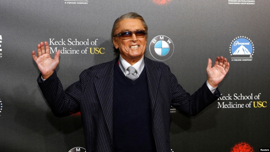 FILE - Producer Robert Evans poses at the second annual "Rebels With a Cause" gala at Paramount Pictures Studios in Los Angeles, California, March 20, 2014. 