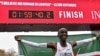 Kenyan Breaks Marathon 2-Hour Mark
