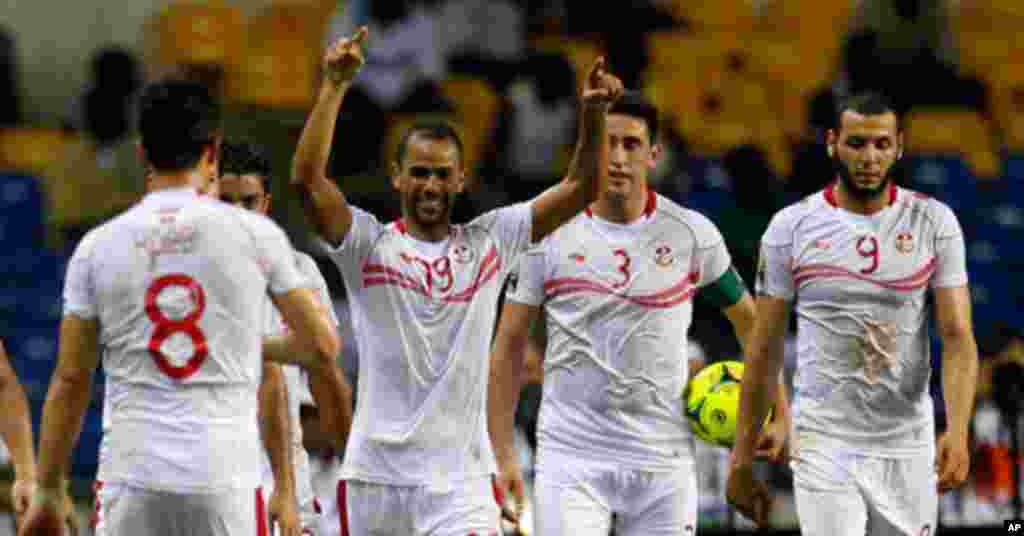 Tunisia's Saber celebrates his first goal with teammates during their African Cup of Nations soccer match against Morocco in LibrevilleTunisia's Saber celebrates his first goal with teammates during their African Cup of Nations soccer match against Morocc