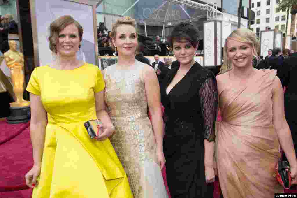 Oscar®-nominees Selma Vilhunen (L) and Kirsikka Saari (2nd from L) and guests arrive for the live ABC Telecast of The 86th Oscars® on March 2, 2014 in Hollywood, CA. (Photo courtesy AMPAS).