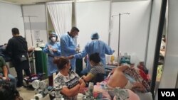 El sistema de salud en Honduras está funcionando por encima de su capacidad ante una nueva ola del COVID-19. Foto Oscar Ortiz, VOA.