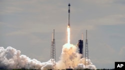 FILE - A SpaceX Falcon 9 rocket lifts off from launch pad 40 at Cape Canaveral Space Force Station Saturday, at Cape Canaveral, Florida, Sept. 28, 2024.