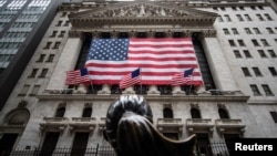 The New York Stock Exchange (NYSE) is seen in the financial district of lower Manhattan during the outbreak of the coronavirus disease (COVID-19) in New York City, April 26, 2020. 