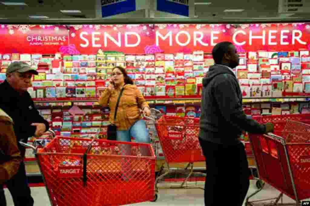 Meena Nabavi looks for a friend in a Target store in Roswell, Ga., on Friday, Nov. 25, 2011. Nabavi is from Birmingham, Ala, and was in the Roswell area for Thanksgiving. (AP Photo/Rich Addicks)