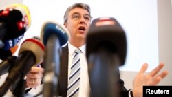 Andreas Mundt, president of Germany's Federal Cartel Office addresses a news conference presenting findings of the anti-trust watchdog's investigation into Facebook's data collection practices in Bonn, Germany, Feb. 7, 2019. 