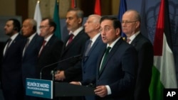 Spain's Foreign Minister Jose Manuel Albares speaks next to Palestinian Prime Minister Mohammad Mustaf, right, and European Union foreign policy chief Josep Borrell, 3rd from right, during a meeting of European and Muslim nations in Madrid, Spain, Sept. 13, 2024.