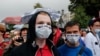 People gather to collect signatures to cancel the results of voting on amendments to the Constitution in Moscow, Russia, July 15, 2020. Writing on the face masks reads "no." 