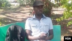 FILE: Itai Dzamara staging a sit-in at Harare's Africa Unity Square, October 21, 2014. (Photo: By Frank Chikowore)