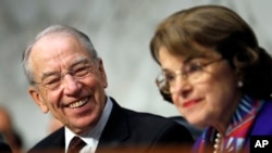 Senate Judiciary Committee Chairman Chuck Grassley, R-Iowa, left, looks to ranking member Sen. Dianne Feinstein, D-California, as Attorney General Jeff Sessions testifies before the Senate Judiciary Committee on Capitol Hill in Washington, Oct. 18, 2017.