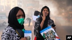 Sudanese women shout during a demonstration in Khartoum, Sudan, Wednesday, June 3, 2020.