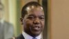 FILE: Zimbabwean central bank governor John Mangudya delivers his 2016 Monetary Policy statement in Harare, Feb. 4, 2016.