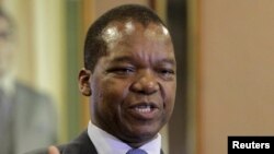 FILE: Zimbabwean central bank governor John Mangudya delivers his 2016 Monetary Policy statement in Harare, Feb. 4, 2016.