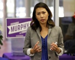 FILE - Florida Democratic Congressional candidate Stephanie Murphy meets with voters at a senior center in Altamonte Springs, Fla., Oct. 18, 2016.