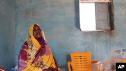 FILE - Raqiya Abdsalam, who survived a bout of dengue fever, sits at her home in El-Obeid, Sudan on January 23, 2023. A surge in mosquito-borne diseaseshas shown the fragility of Sudan's health system, and bodes ill for coming challenges.