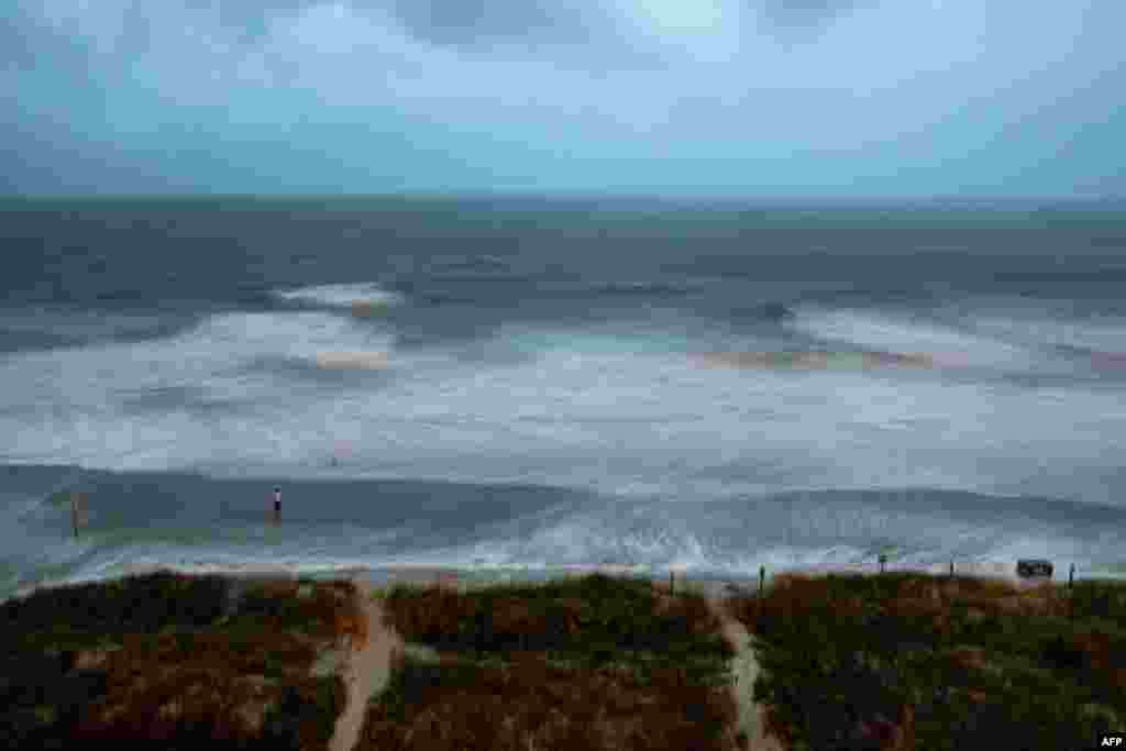 The surf picks up as Hurricane Isaias approaches North Myrtle Beach, South Carolina, Aug. 3, 2020.