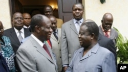 Alassane Ouattara (à gauche) et Henri Konan Bédié