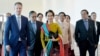 FILE - Myanmar State Counsellor Aung San Suu Kyi departs from Naypyidaw International Airport ahead of her appearance at the International Court of Justice, Dec. 8, 2019, to defend the nation against charges of genocide of its Rohingya Muslim minority.