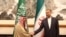 FILE- Iranian Foreign Minister Hossein Amirabdollahian, right, meets with Saudi Arabia's Foreign Minister Prince Faisal bin Farhan Al Saud in Beijing.