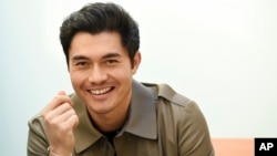 FILE - Actor Henry Golding is pictured at the Orlando Hotel in Los Angeles, Nov. 9, 2018. Golding, who starred in the hit film "Crazy Rich Asians," was named as one of 2018's Breakthrough Entertainers of the Year by the Associated Press.