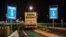 FILE - A truck from Britain drives through a customs area to enter France at the Eurotunnel terminal, in Coquelles, northern France, Jan. 1, 2021.