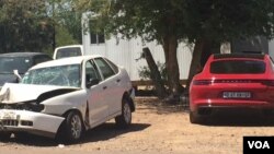 Mrs. Grace Mugabe's red Porsche (right) was involved in an accident with another vehicle along the Plumtree-Gaborone road on Friday night. (Picture: Martin Ngwenya)