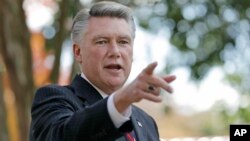 FILE - Mark Harris speaks during a news conference in Matthews, N.C., Nov. 7, 2018. His congressional race with Harris against Democrat Dan McCready is unresolved while North Carolina election investigators look into absentee-ballot fraud allegations.