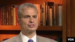 Analitičar Džon Sitilidis