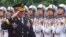 U.S. Chairman of the Joint Chiefs of Staff General Martin Dempsey reviews the honor guard during a welcoming ceremony in Hanoi, Aug. 14, 2014.