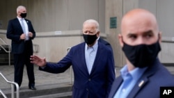 Democratic presidential candidate and former Vice President Joe Biden departs after voting early in Delaware's state primary election at the New Castle County Board of Elections office in Wilmington, Del., Monday, Sept. 14, 2020. (AP Photo/Patrick…