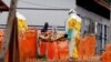 FILE - Health workers carry a newly admitted confirmed Ebola patient into a treatment centre in Butembo in the eastern Democratic Republic of Congo, March 28, 2019.