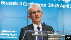 FILE - U.N. Under-Secretary-General for Humanitarian Affairs and Emergency Relief Coordinator Mark Lowcock addresses the media at a EU Council meeting in Brussels, April 25, 2018. 