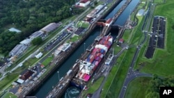 FILE - A cargo ship traverses the Agua Clara Locks of the Panama Canal in Colon, Panama, Sept. 2, 2024.