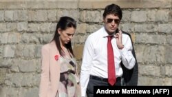 Perdana Menteri Selandia Baru Jacinda Ardern (kiri) berbicara dengan Perdana Menteri Kanada Justin Trudeau dalam pertemuan antara kepala negara persemakmuran (commonwealth) di London, Inggris, pada 20 April 2018. (Foto: AFP/Andrew Matthews)