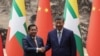中国国家主席习近平在北京人民大会堂举行的签字仪式上与到访的缅甸总统敏昂莱握手。(2026年6月16日)