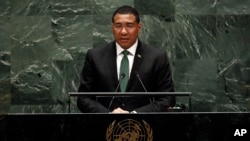 Jamaica's Prime Minister Andrew Holness addresses the 74th session of the United Nations General Assembly, Friday, Sept. 27, 2019. (AP Photo/Richard Drew)