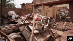 FILE: A house hit in recent fighting Is seen in Khartoum, Sudan, Tuesday, April 25, 2023. Sudan's warring generals have pledged to observe a new three-day truce that was brokered by the United States and Saudi Arabia to try to pull Africa's third-largest nation from the abyss.