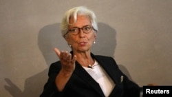 FILE - Managing Director of the International Monetary Fund, Christine Lagarde, speaks at the Bank of England conference 'Independence 20 Years On' at the Fishmonger's Hall in London, Britain, Sept. 29, 2017.