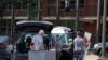 Students and parents begin to move students' belongings out of Bragaw Hall at North Carolina State University in Raleigh, N.C., Aug. 27, 2020, in response to coronavirus clusters on campus.