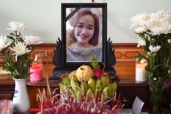 A portrait of Bui Thi Nhung, who is feared to be among the 39 people found dead in a truck in Britain, is kept on a prayer altar at her house in Vietnam's Nghe An province, Oct. 27, 2019.